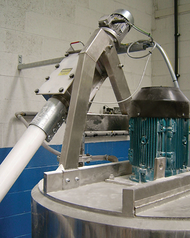 Bulk Handling System Eliminates Dust, Reduces Material Waste, and Streamlines Production of Corrugated Board