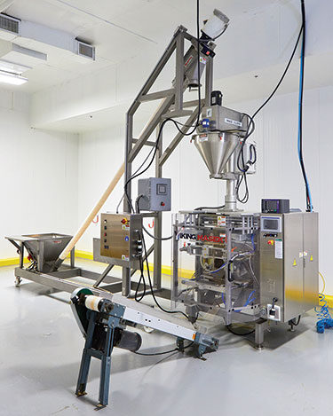 Brittle Pasta Handled Gently, Automatically with Box Dumpers, Tubular Cable Conveyors